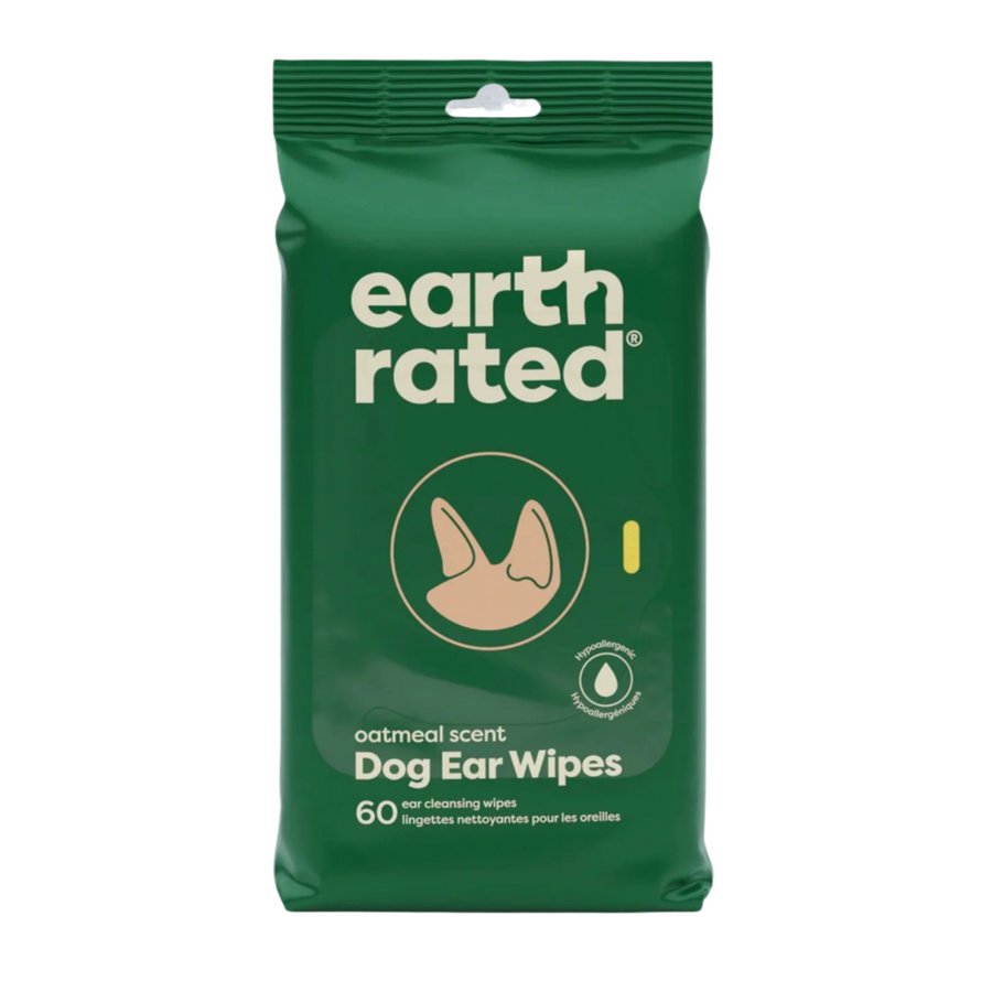 Earth Rated Dog Ear Wipes, 60-count, oatmeal-scented dog grooming wipes in a green packaging displayed on a white wooden surface.