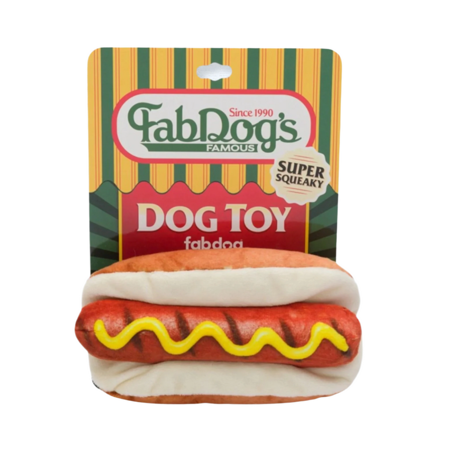 Plush hot dog dog toy from FabDog, a brand providing high-quality pet products at Ella's Emporium, a store specializing in the best dog products.