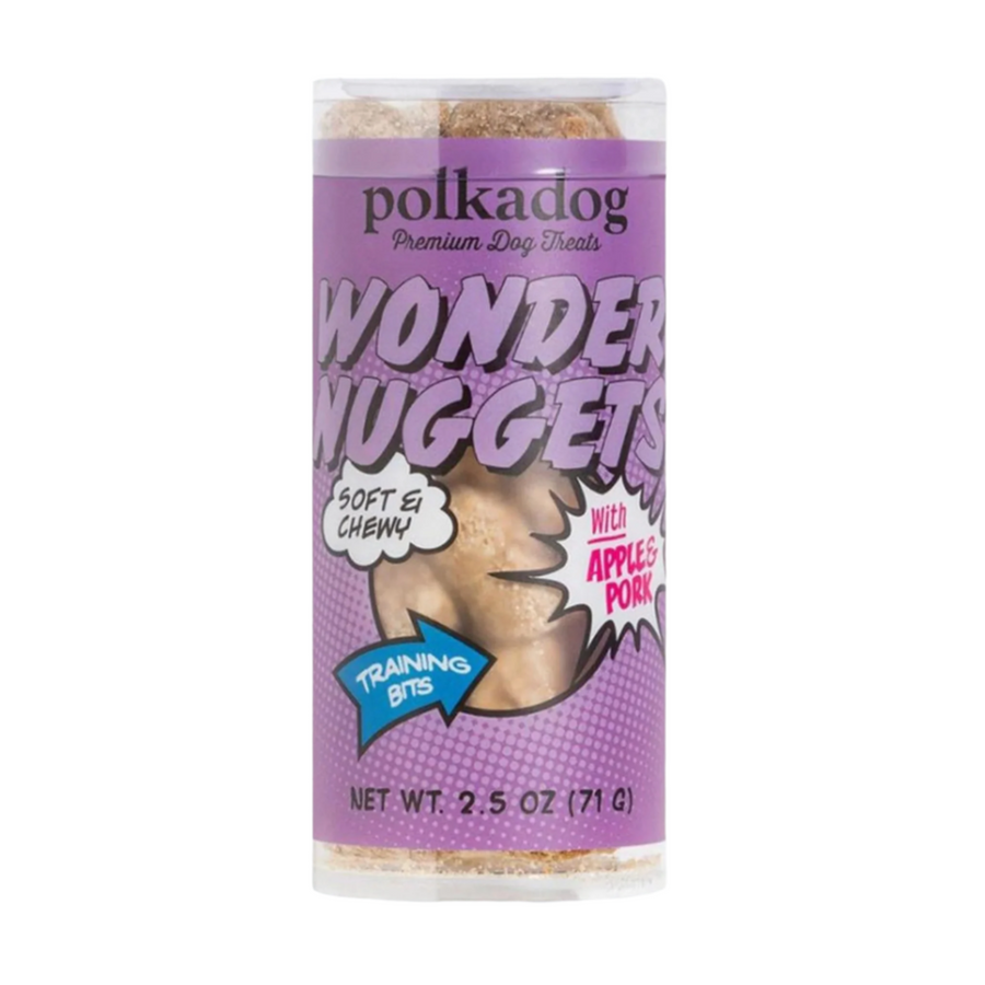 Polka Dog Wonder Nuggets dog treats with pork and apple, packaged in a clear plastic container for display on the shelves of Ella's Emporium, a store specializing in high-quality dog products.