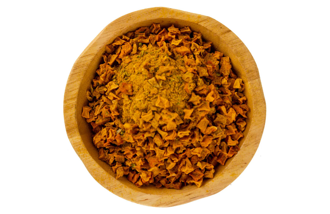 Grandma Lucy's Pumpkin Pouch Inflammation Dog Food: Freeze-dried, natural dog food in a wooden bowl.