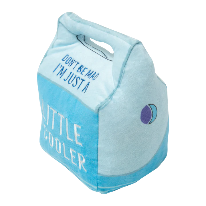 Plush dog toy in a blue fabric carrier with the text "Don't be mad, I'm just a little cuddler" printed on it.